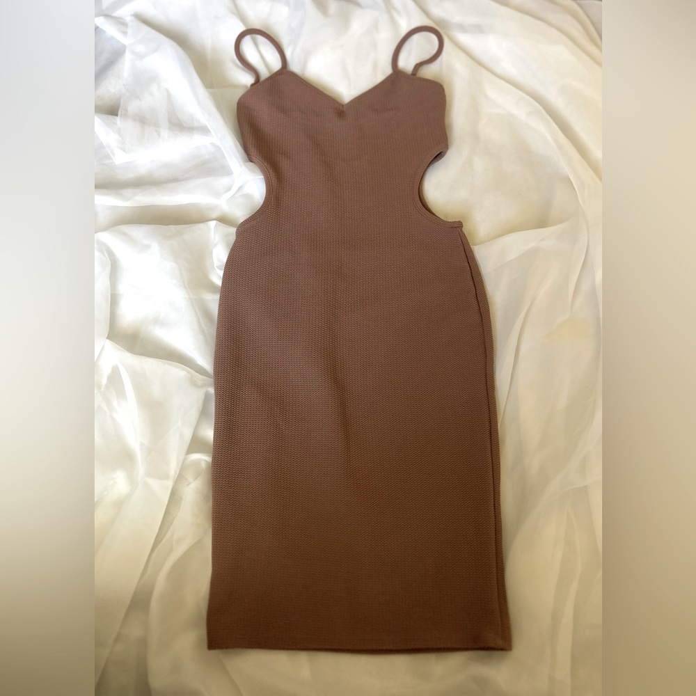 Dusty pink cut out dress.